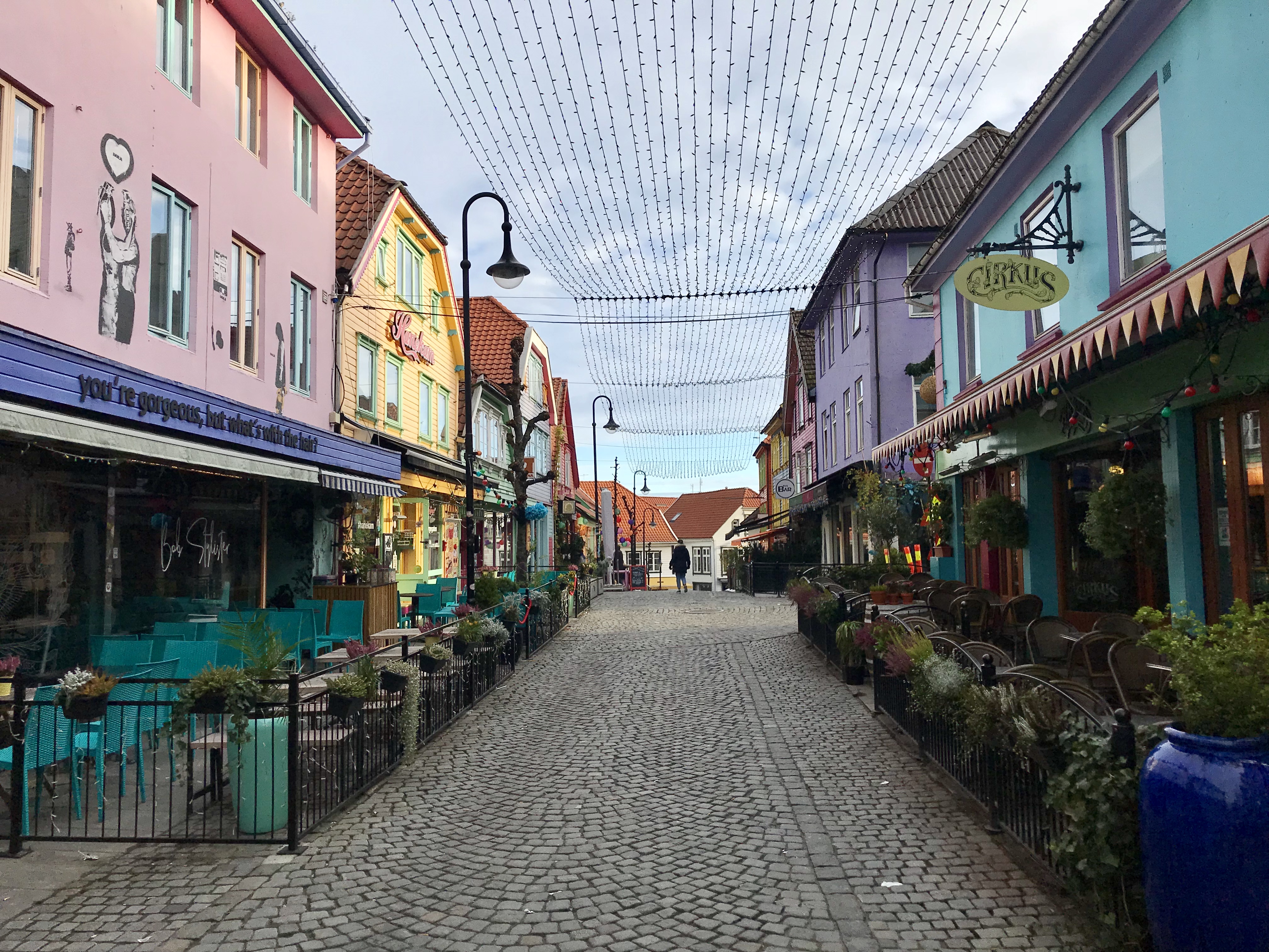 Colourful painted shopfronts on Øvre Holmegate — Fargegaten — in central Stavanger